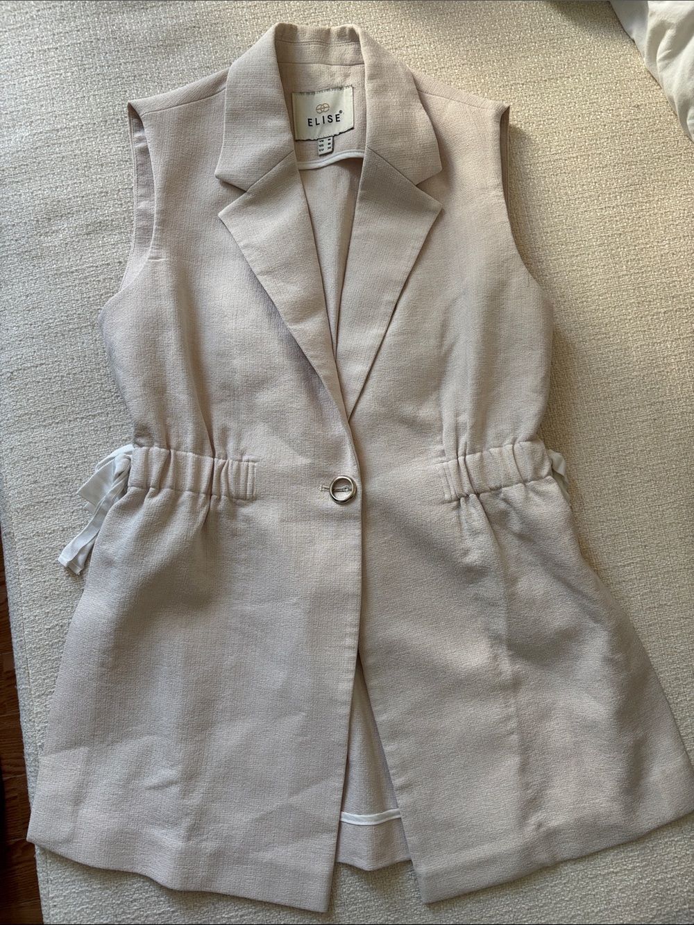 Elise cream sleeveless vest - size M